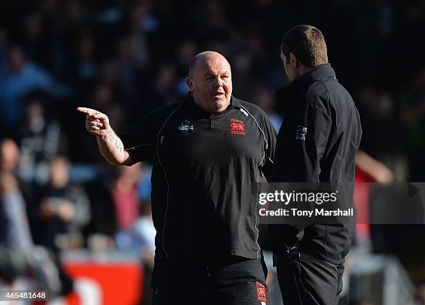 Justin Burnell, Head Coach of London Welsh talking to Rob Baxter, Director of Rugby of Exeter Chiefs during the Aviva Premiership match between...