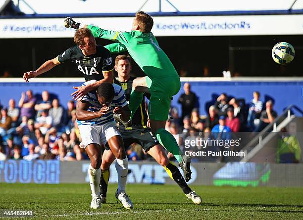 Harry Kane of Spurs beats Robert Green of QPR to score their first goal with a header during the Barclays Premier League match between Queens Park...