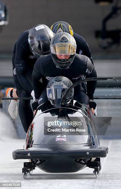 Lamin Deen, Ben Simons, Bruce Tasker and Andrew Matthews of Great Britain compete in their first run of the four man bob competition during the FIBT...