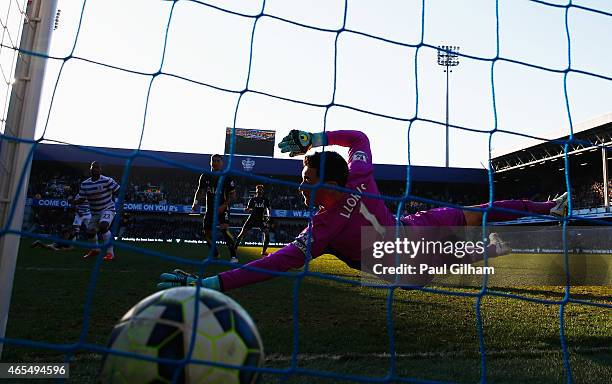 Hugo Lloris of Spurs fails to stop Sandro of QPR from scoring their first goal during the Barclays Premier League match between Queens Park Rangers...