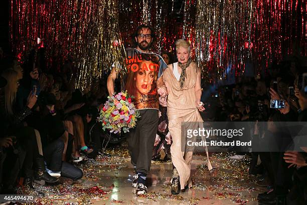 Andreas Kronthaler and Vivienne Westwood acknowledge the audience on the runway after the Vivienne Westwood show as part of the Paris Fashion Week...