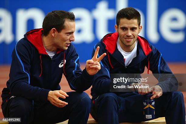 Renaud Lavillenie of France talks to Valentin Lavillenie of France as they compete in the Men's Pole Vault Finalduring day two of the 2015 European...