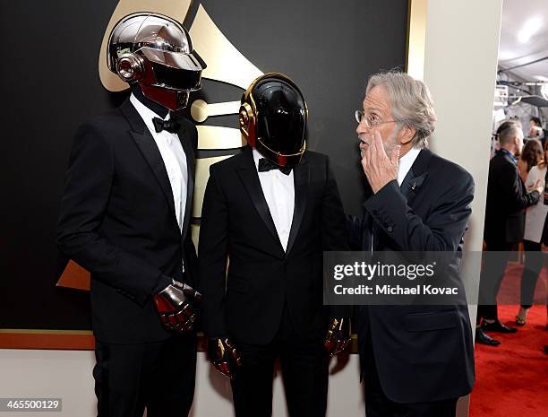 President of the National Academy of Recording Arts and Sciences Neil Portnow and musical group Daft Punk attend the 56th GRAMMY Awards at Staples...