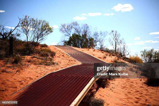 Walkway to the viewing area overlooking Uluru is sen on November 27, 2013 in Uluru-Kata Tjuta National Park, Australia. Uluru/ Ayers Rock is a large...