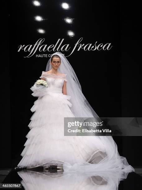 Model walks the runway during Raffaella Frasca S/S 2014 Italian Haute Couture colletion fashion show as part of AltaRoma AltaModa Fashion Week at...