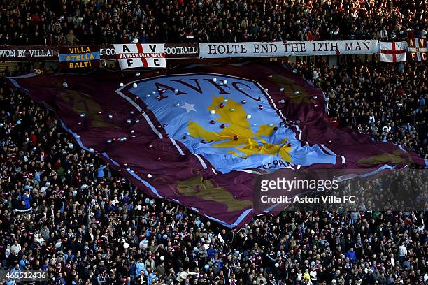 Aston Villa supporters with a giant flag in the Holte End prior to the FA Cup Quarter Final match between Aston Villa and West Bromwich Albion at...
