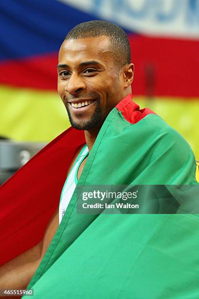 Nelson Evora of Portgual celebrates winning gold in the Men's Triple Jump Final during day two of the 2015 European Athletics Indoor Championships at...