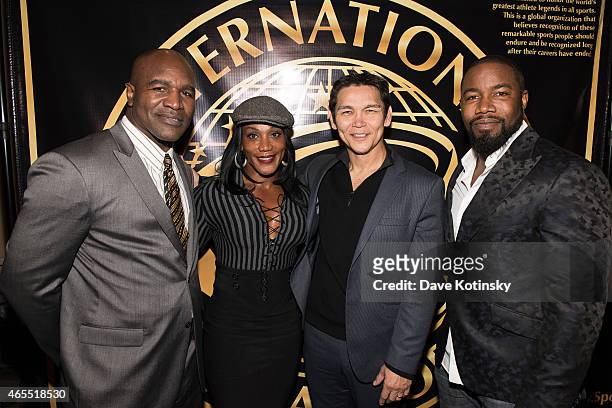 Hall of Fame Inductees Boxer Evander Holyfield, Ms. Olympia Lenda Murray, Don 'The Dragon' Wilson and actor Michael Jai White attend Arnold Sports...