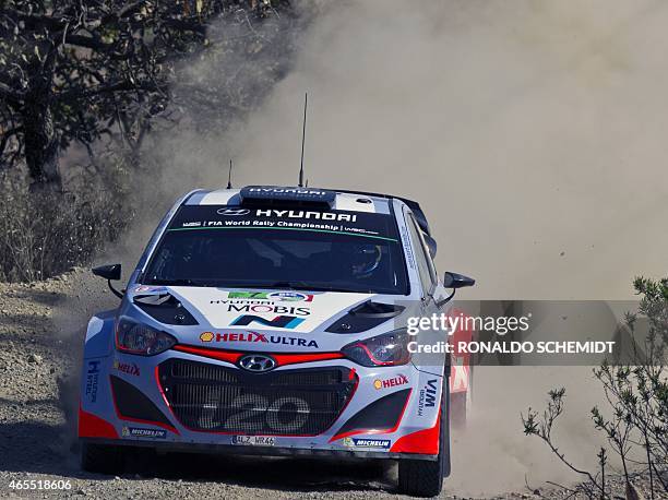 Belgian Thierry Neuville steers his Hyundai i20 WRC during the second day of the 2015 FIA World Rally Championship in Leon, Guanajuato State, Mexico,...