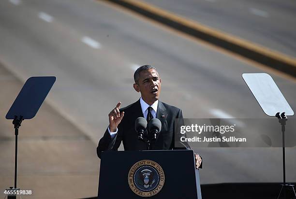 President Barack Obama speaks in front of the Edmund Pettus Bridge on March 7, 2015 in Selma, Alabama. Selma is commemorating the 50th anniversary of...