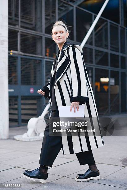 Guest arrives at the Acne studios show on Day 5 of Paris Fashion Week Womenswear FW15 on March 7, 2015 in Paris, France.