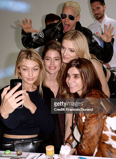 Gigi Hadid, Doutzen Kroes, Lily Donaldson, Jared Leto and Carine Roitfeld attend the Paris Fashion Week Tasting Night with Galaxy featuring Brad...