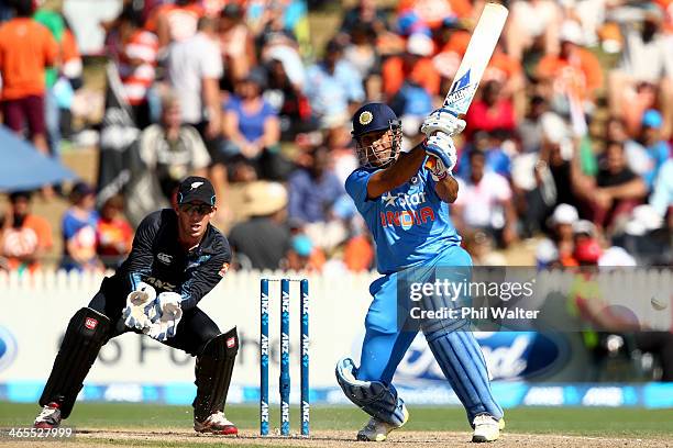 Dhoni of India bats during game four of the men's one day international series between New Zealand and India at Seddon Park on January 28, 2014 in...