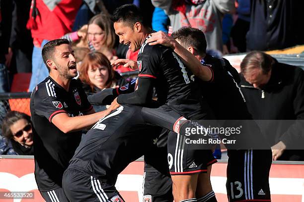 Jairo Arrieta of D.C. United celebrates with teammates after scoring a second half goal against the Montreal Impact during their 1-0 win at RFK...
