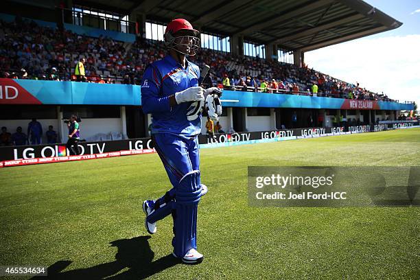 Usman Ghani of Afghanistan walks onto the field during the 2015 ICC Cricket World Cup match between New Zealand and Afghanistan at McLean Park on...