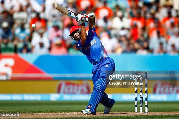 Nawroz Mangal of Afghanistan bats during the 2015 ICC Cricket World Cup match between New Zealand and Afghanistan at McLean Park on March 8, 2015 in...