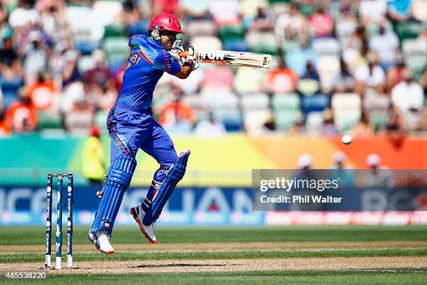 Mohammad Nabi of Afghanistan bats during the 2015 ICC Cricket World Cup match between New Zealand and Afghanistan at McLean Park on March 8, 2015 in...