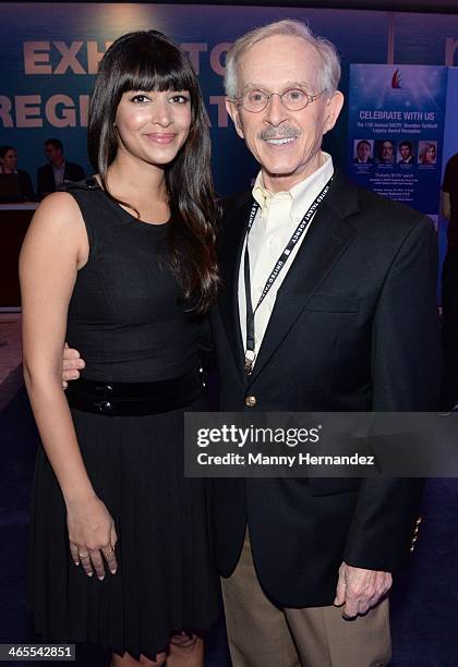 Hannah Simone and Dickie Smothers are sighted at NATPE 2014 in Miami Beach at Fontainebleau Miami Beach on January 27, 2014 in Miami Beach, Florida.