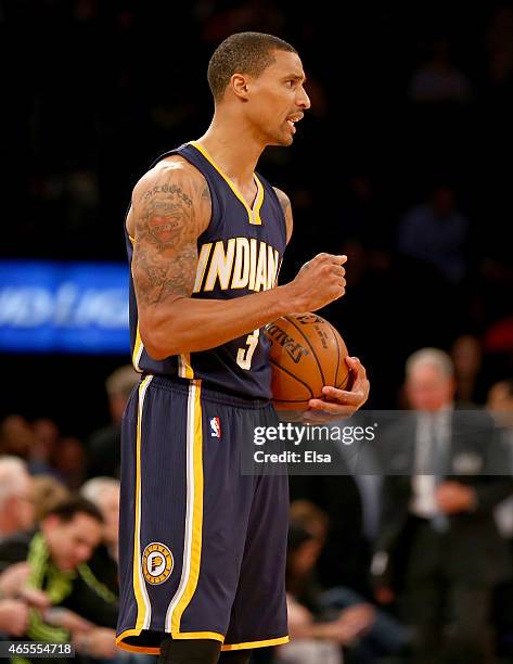George Hill of the Indiana Pacers celebrates the win over the New York Knicks at Madison Square Garden on March 7, 2015 in New York City.The Indiana...
