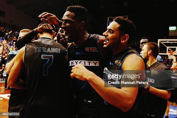 Ekene Ibekwe of the Breakers celebrates with Corey Webster of the Breakers after making the winning hsot to win game two of the NBL Grand Final...