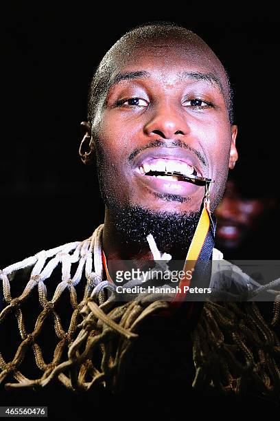 Cedric Jackson of the Breakers celebrates with his MVP medal after winning during game two of the NBL Grand Final series between the New Zealand...
