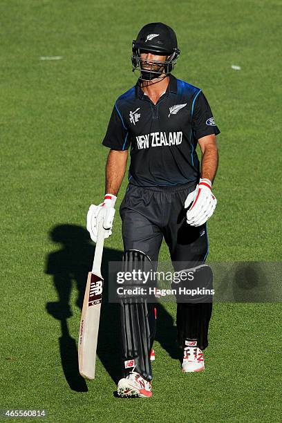 Grant Elliott of New Zealand leaves the field after being dismissed during the 2015 ICC Cricket World Cup match between New Zealand and Afghanistan...