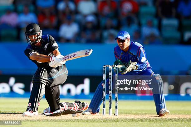 Grant Elliott of New Zealand bats during the 2015 ICC Cricket World Cup match between New Zealand and Afghanistan at McLean Park on March 8, 2015 in...