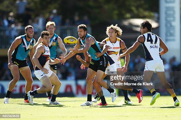 Travis Boak of the Power wins the ball during the NAB Challenge match between the Port Adelaide Power and the West Coast Eagles at Norwood Oval on...