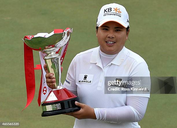 Inbee Park of South Korea with the winners after the final round of the HSBC Women's Champions at the Sentosa Golf Club on March 8, 2015 in...