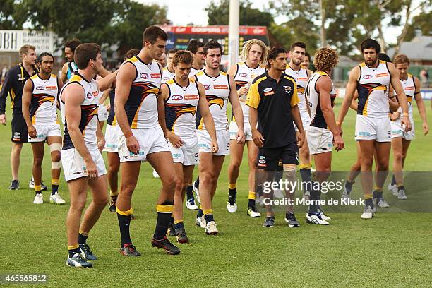 Eagles players come from the field after the NAB Challenge match between the Port Adelaide Power and the West Coast Eagles at Norwood Oval on March...