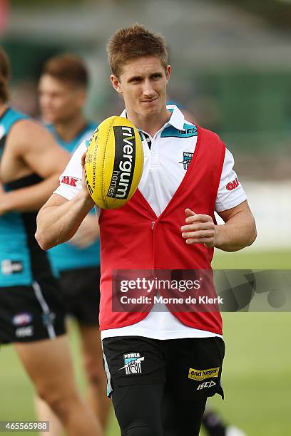 Hamish Hartlett of the Power looks on after getting injured in the NAB Challenge match between the Port Adelaide Power and the West Coast Eagles at...