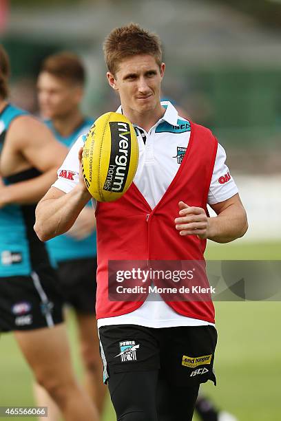 Hamish Hartlett of the Power looks on after getting injured in the NAB Challenge match between the Port Adelaide Power and the West Coast Eagles at...