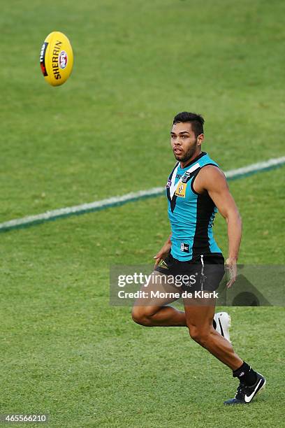 Jarman Impey of the Power runs after the ball during the NAB Challenge match between the Port Adelaide Power and the West Coast Eagles at Norwood...