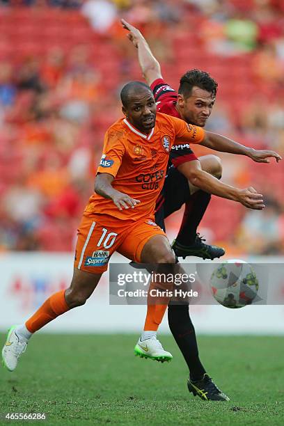 Of the Roar and Samuel Callaway of the Wanderers compete for the ball during the round 20 A-League match between the Brisbane Roar and the Western...