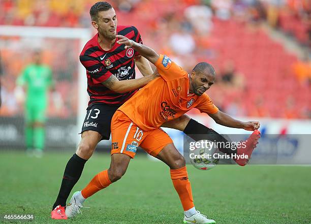 Of the Roar and Matthew Spiranovic of the Wanderers compete for the ball during the round 20 A-League match between the Brisbane Roar and the Western...