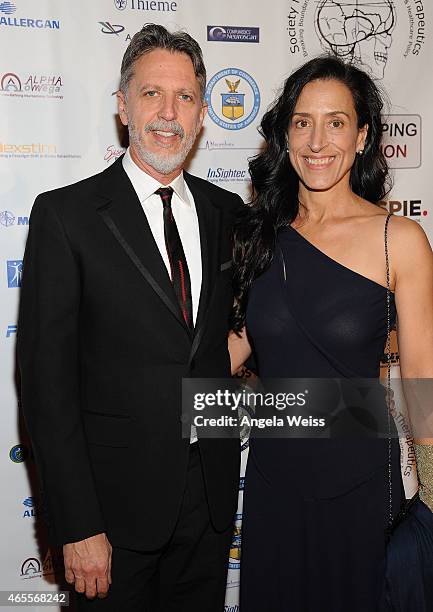 Writer Tim Kring and guest attend Society For Brain Mapping And Therapeutics 12th Annual World Congress Black Tie Gala at Millennium Biltmore Hotel...