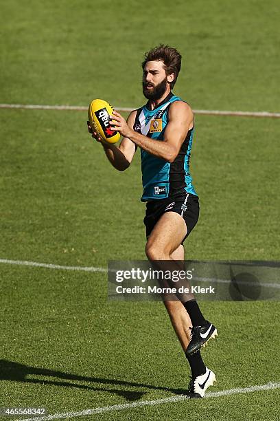 Justin Westhoff of the Power takes a mark during the NAB Challenge match between the Port Adelaide Power and the West Coast Eagles at Norwood Oval on...