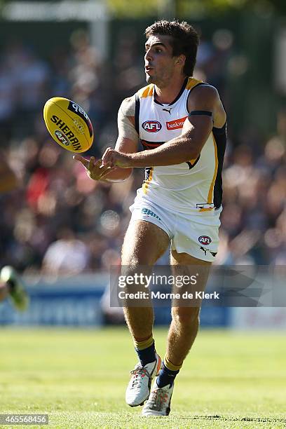 Andrew Gaff of the Eagles passes the ball during the NAB Challenge match between the Port Adelaide Power and the West Coast Eagles at Norwood Oval on...