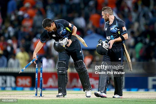 Ross Taylor of New Zealand and Brendon McCullum leave the field following game four of the men's one day international series between New Zealand and...