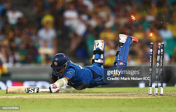 Mahela Jayawardene of Sri Lanka is run out by Michael Clarke of Australia during the 2015 ICC Cricket World Cup match between Australia and Sri Lanka...