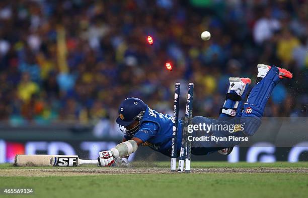 Mahela Jayawardene of Sri Lanka is run out by Michael Clarke of Australia during the 2015 ICC Cricket World Cup match between Australia and Sri Lanka...