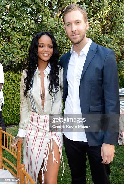 Rihanna and Calvin Harris attend the Roc Nation Pre-GRAMMY Brunch presented by MAC Viva Glam at Private Residence on January 25, 2014 in Beverly...