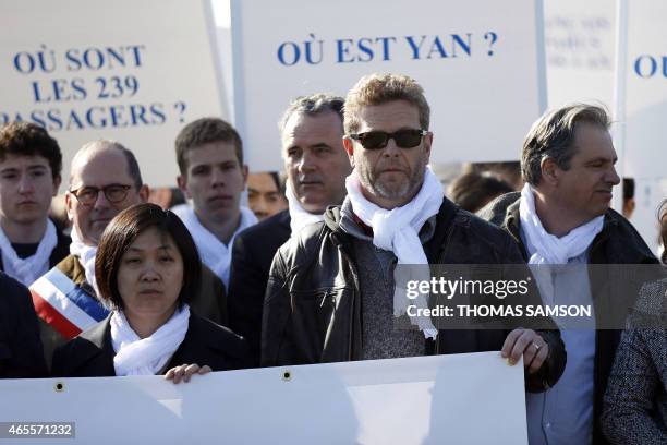 Ghyslain Wattrelos takes part in a silent march towards the Elysee Palace in Paris to deliver a petition signed by 18000 people, on the first...