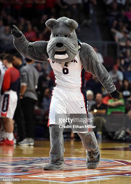 The Gonzaga Bulldogs mascot Spike the Bulldog dances on the court during a quarterfinal game of the West Coast Conference Basketball tournament...