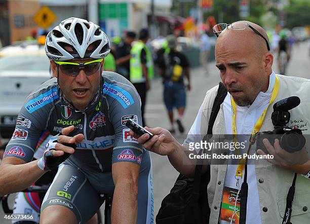 Alessandro Petacchi of Southeast is interviewed during Stage 1 of the 2015 Le Tour de Langkawi from Langkawi to Cenang Beach with a distance of 99.2...