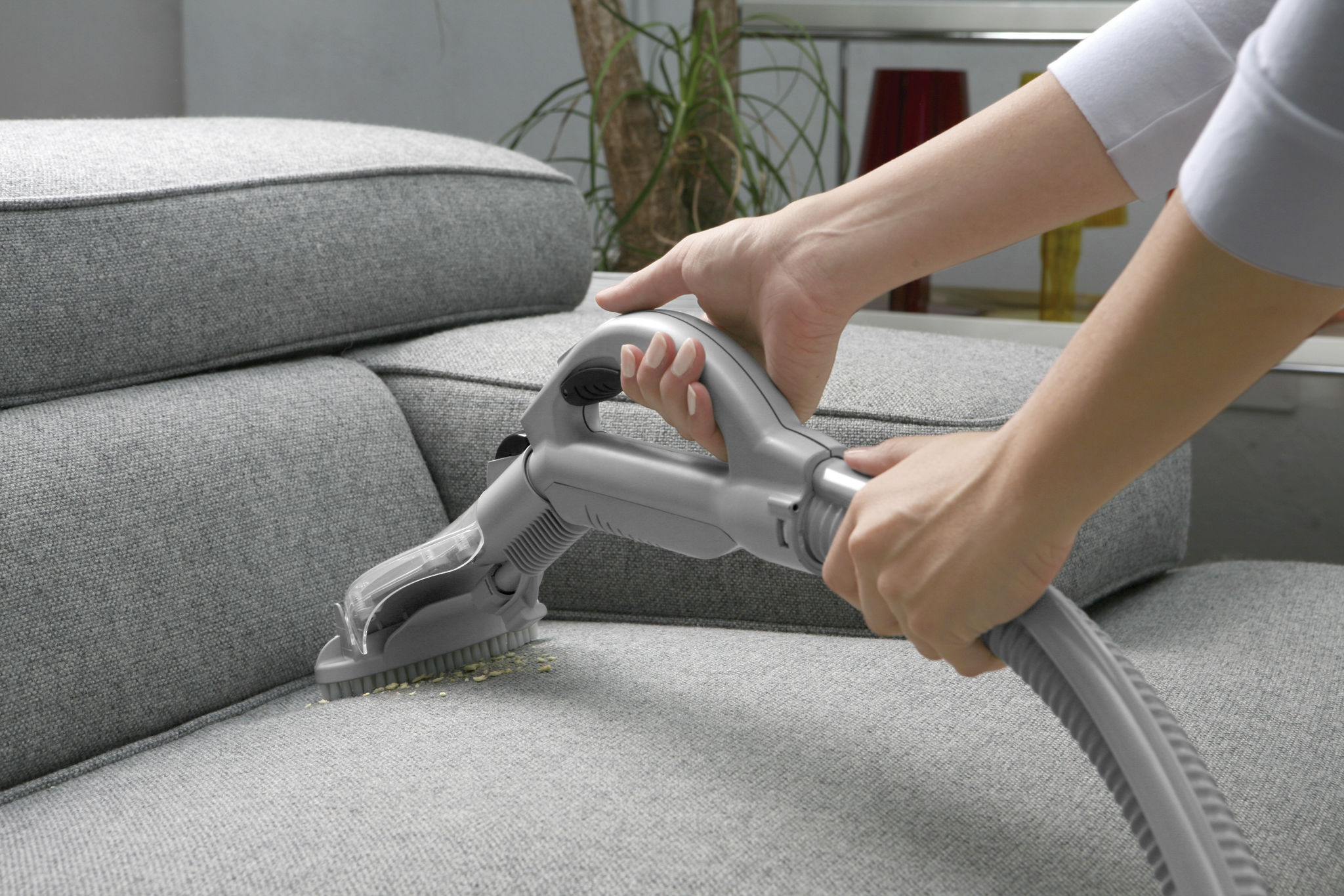 cleaning behind furniture