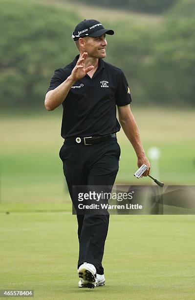 Trevor Fisher Jnr of South Africa celebrates victory on the 18th green during the final round of the Africa Open at East London Golf Club on March 8,...