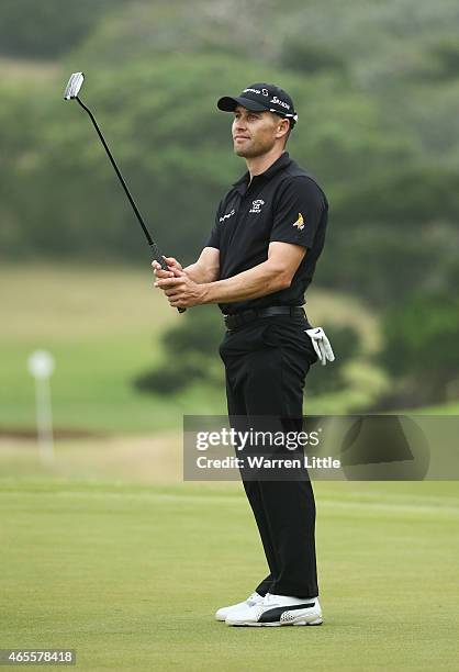 Trevor Fisher Jnr of South Africa celebrates victory on the 18th green during the final round of the Africa Open at East London Golf Club on March 8,...