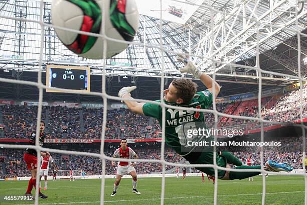 Anwar El-Ghazi of Ajax heads and scores the first and only goal of the game past goalkeeper, Alessandro Damen of Excelsior during the Dutch...