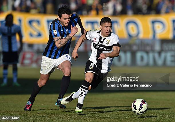 Jose Mauri of Parma FC in action against Mauricio Pinilla of Atalanta BC during the Serie A match between Parma FC and Atalanta BC at Stadio Ennio...